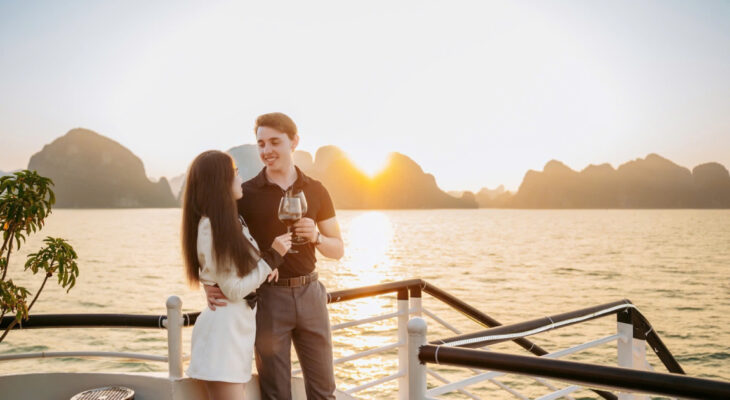 Halong Odyssey Cruise guests enjoy the sunset.